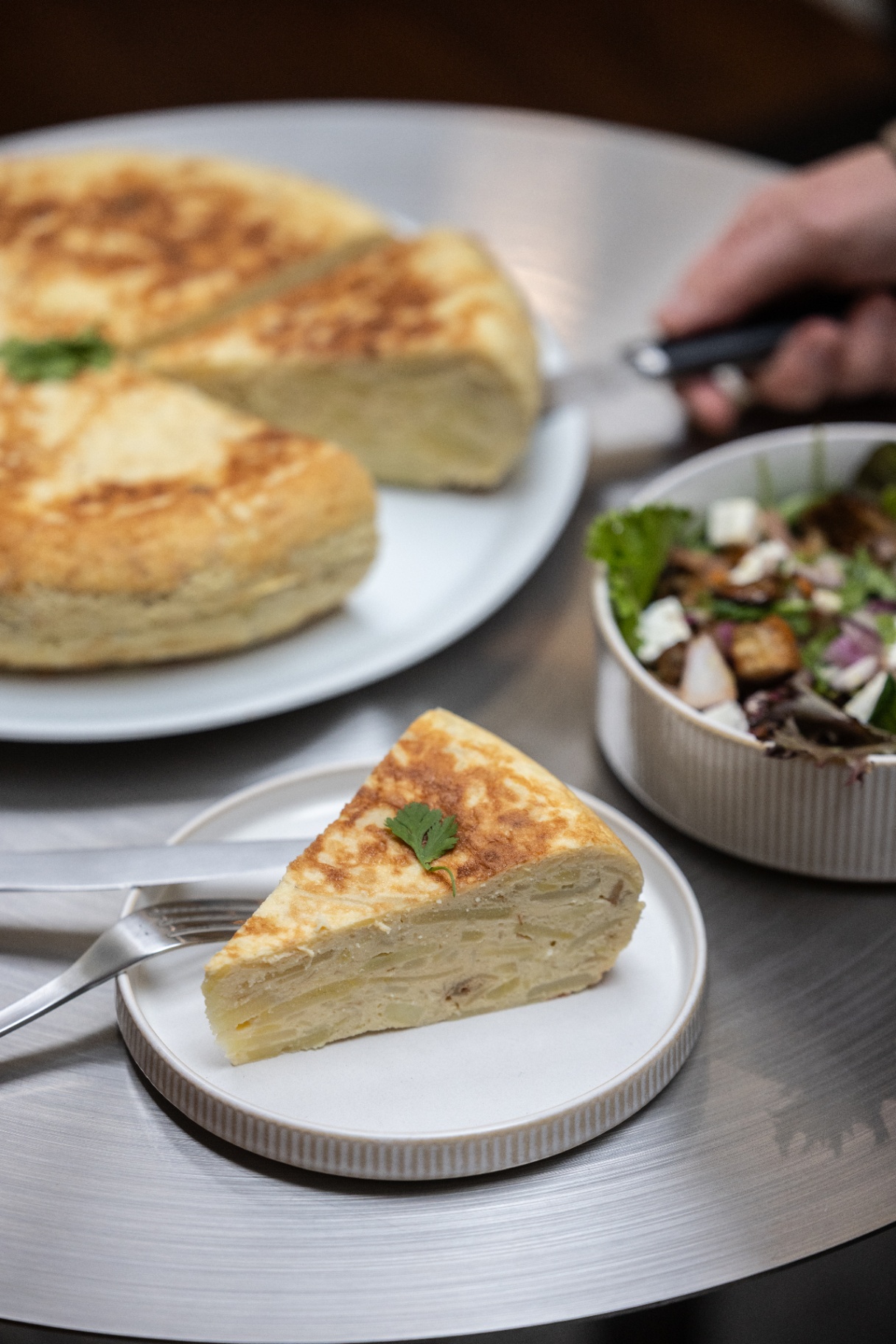 Tortilla tranchée, servie en part